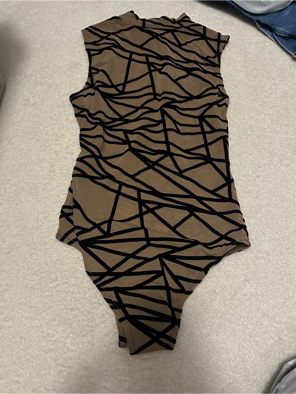 Beige and Black Patterned One-Piece Bodysuit